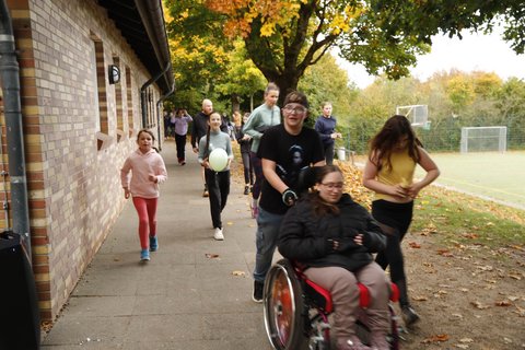Abbildung von Läuferinnen und Läufern beim Lauftag