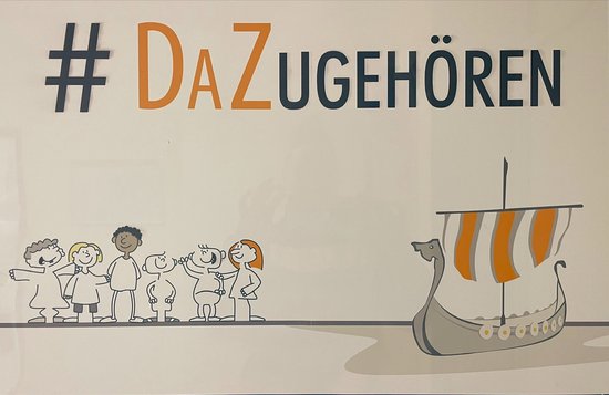 Türschild mit der Bestchriftung: DaZugehören